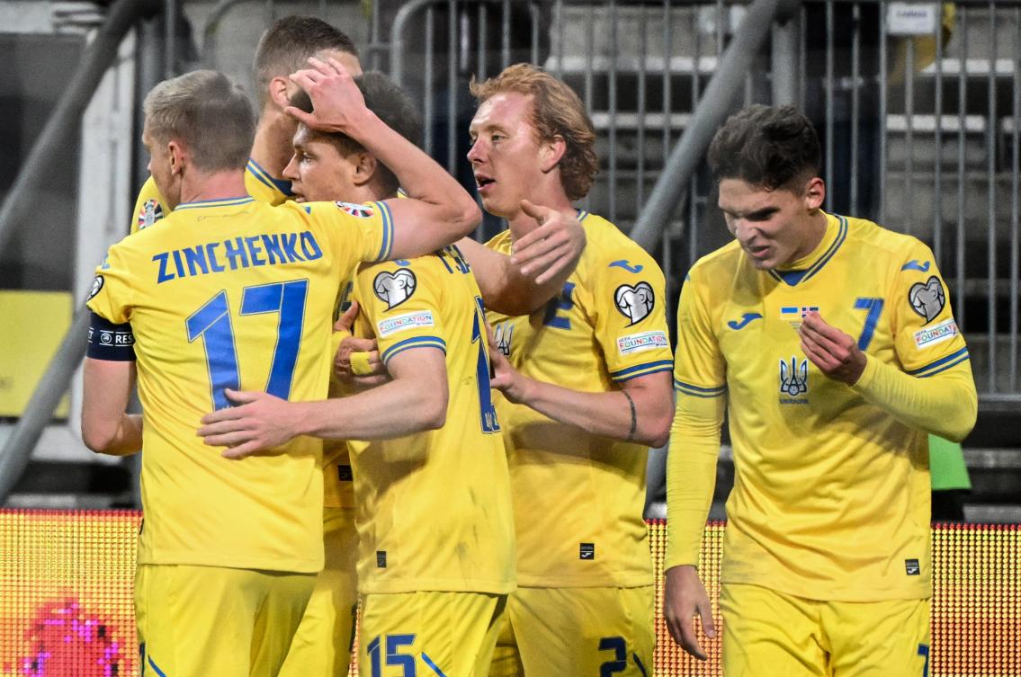 Ukraine’s players celebrate the second goal for Ukraine during the UEFA’s EURO 2024 qualification final play off match against Iceland, in Wroclaw, Poland, on Mar. 26, 2024. (AFP)