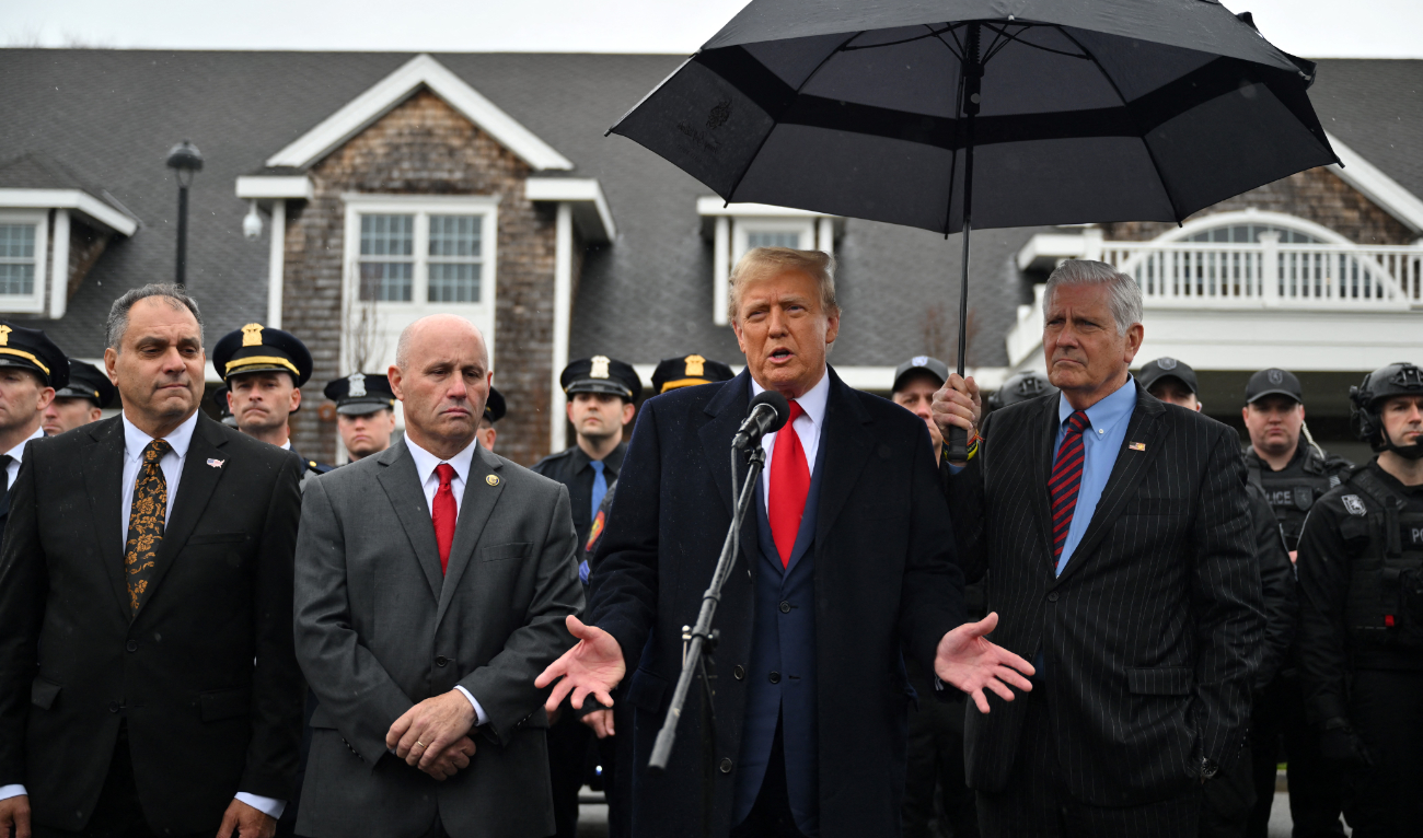 Former US President Donald Trump speaks to the press after attending the wake for New York Police Department (NYPD) Officer Jonathan Diller in Massapequa, Long Island, New York, on March 28, 2024. (AFP)