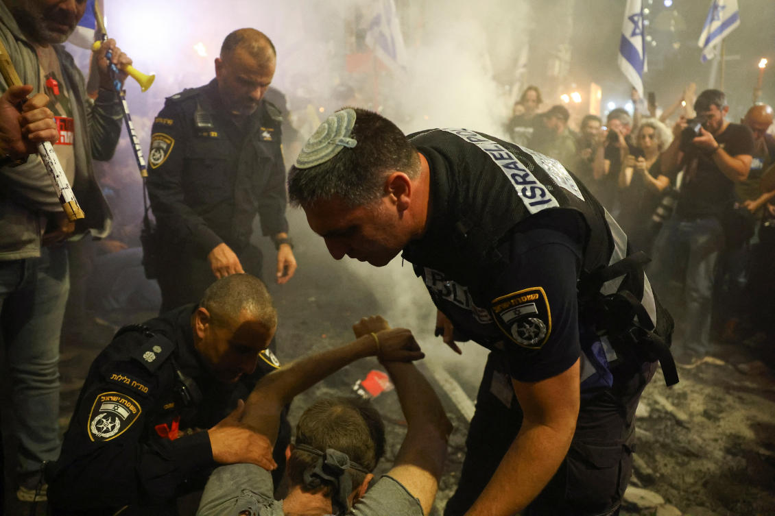 Police officers detain a man during a protest against Israeli Prime Minister Benjamin Netanyahu’s government and calling for the release of hostages kidnapped in the deadly Oct. 7 attack on Israel by Hamas, in Tel Aviv, on Mar. 30, 2024. (Reuters)
