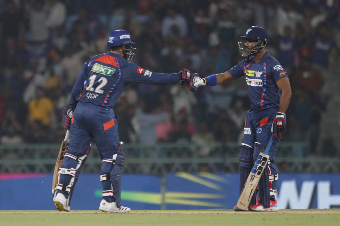 Lucknow Super Giants’ Quinton de Kock, left, fist bumps with batting partner Nicholas Pooran during the Indian Premier League cricket match between Lucknow Super Giants and Punjab Kings in Lucknow, India, Saturday, March 30, 2024.(AP)