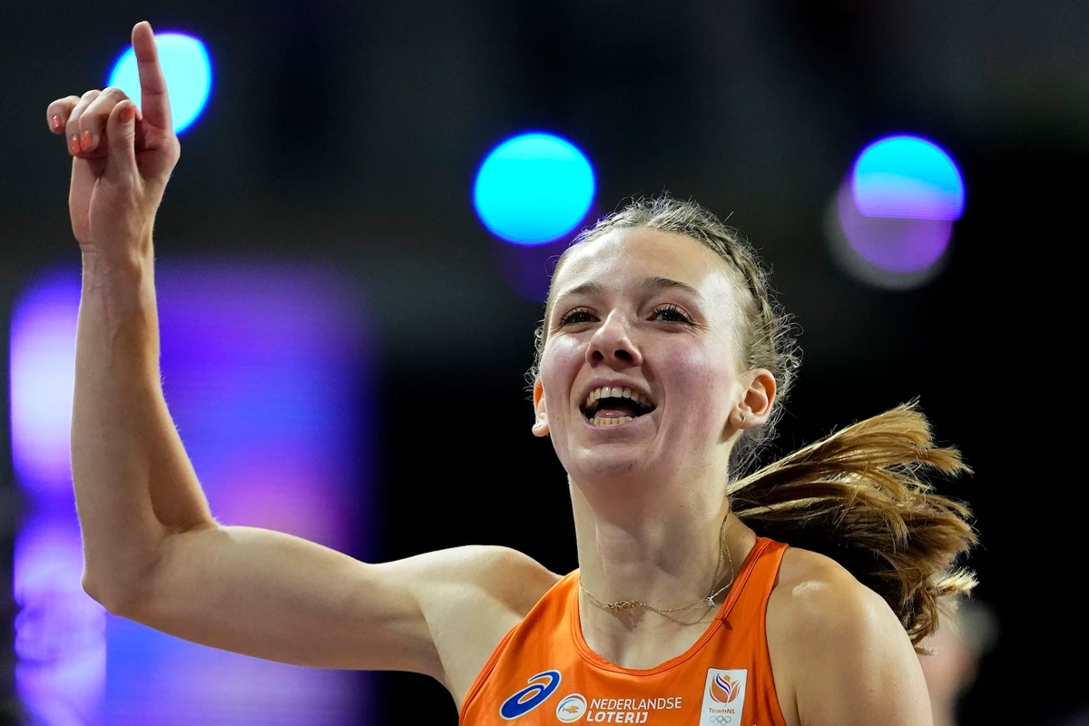 Femke Bol, of the Netherlands, crosses the finish line to win the gold medal and set a new world record in the women's 400 meters during the World Athletics Indoor Championships at the Emirates Arena in Glasgow Saturday. (AP)