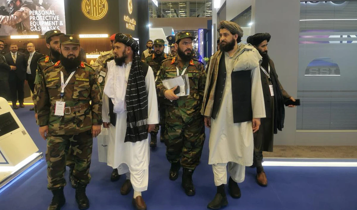 Afghanistan's Minister of Defense, Maulvi Muhammad Yaqub Mujahid (2nd right), and Chief of Staff, Qari Fasihuddin Fitr (3rd left) at the Defense Exhibition of Weapons in Qatar on March 4, 2024. (Photo courtesy: @Zabehulah_M33/X)