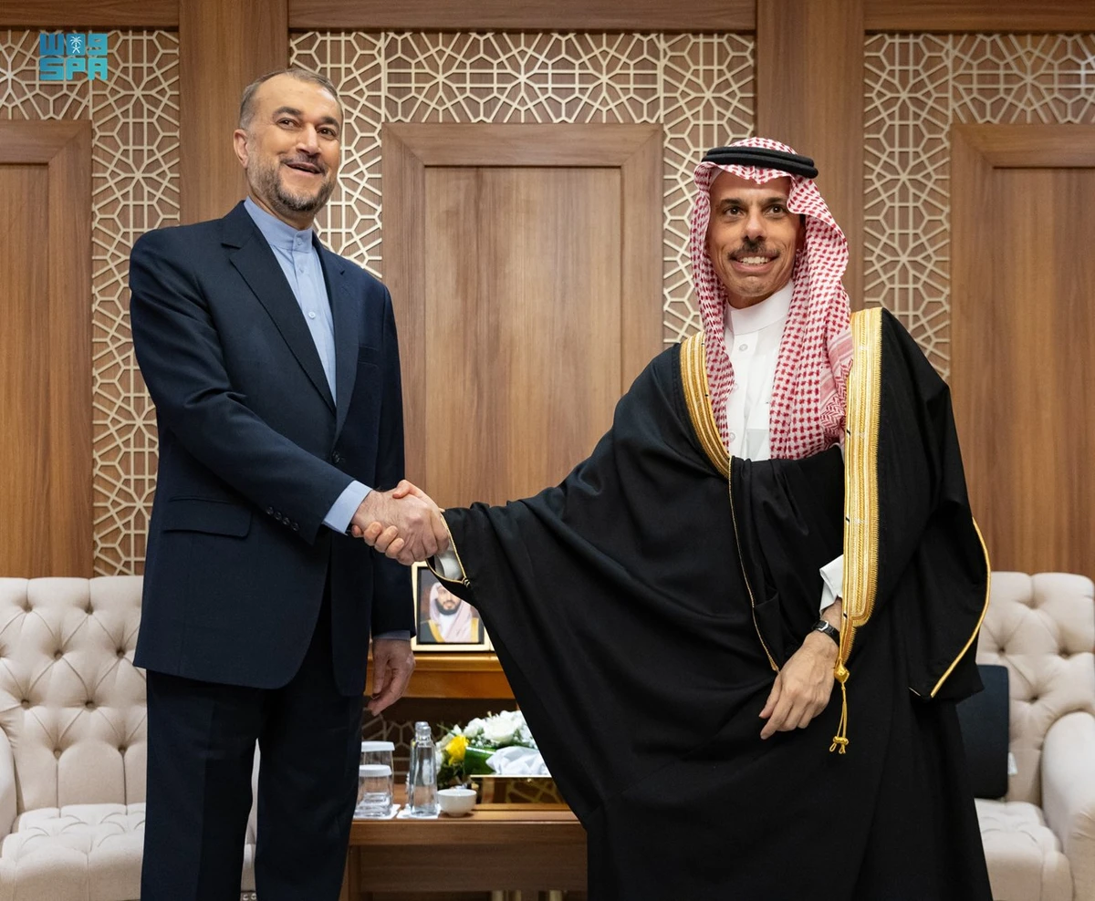 Saudi Arabia’s Foreign Minister Prince Faisal bin Farhan shakes hands with Iranian Foreign Minister Hossein Amir-Abdollahian in Jeddah on Tuesday. (SPA)