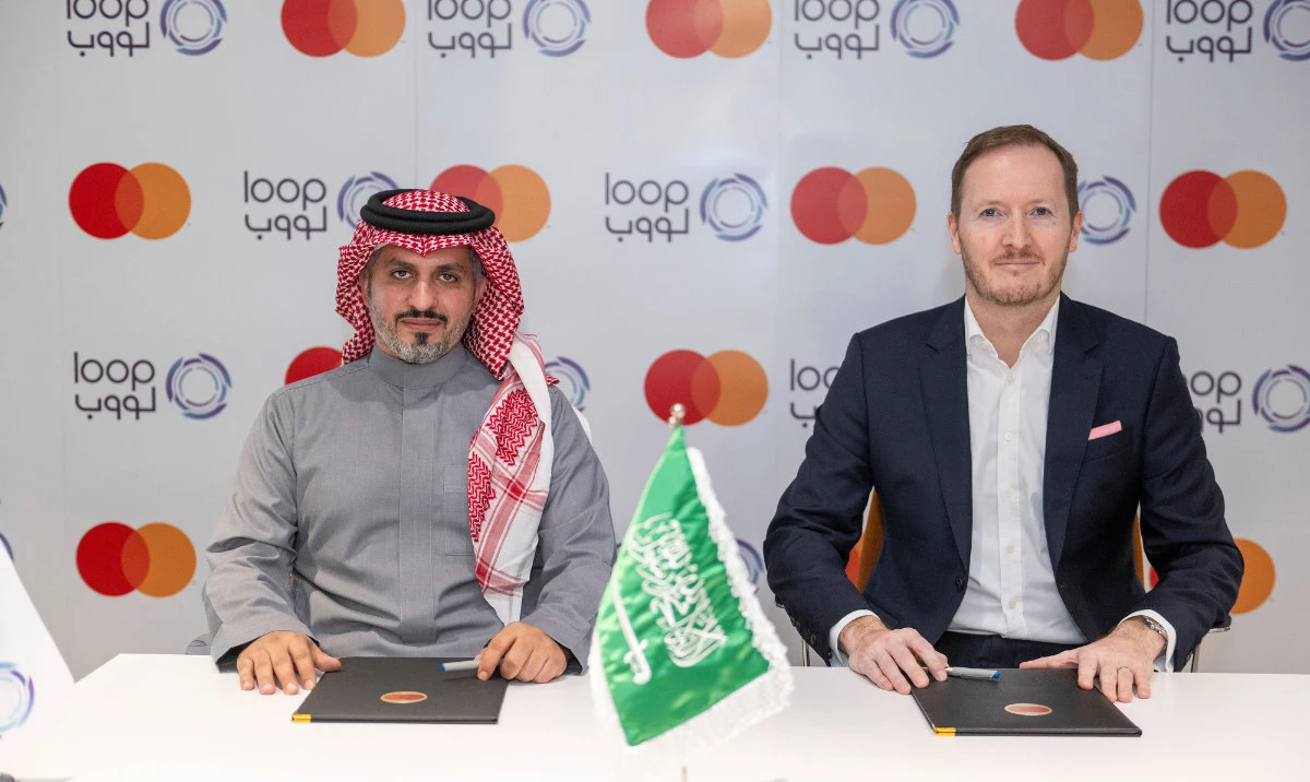 Ali Al-Obaid, CEO, Loop, and Adam Jones, country general manager, MENA Central, Mastercard.