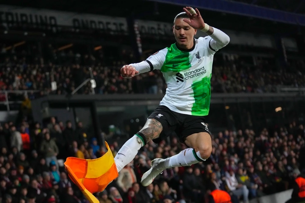 Liverpool's Darwin Nunez kicks the corner flag as he celebrates after scoring his side's third goal during the Europa League round of 16 first leg between Sparta Praha and Liverpool at the Epet Arena in Prague, Czech Republic, Thursday. (AP)