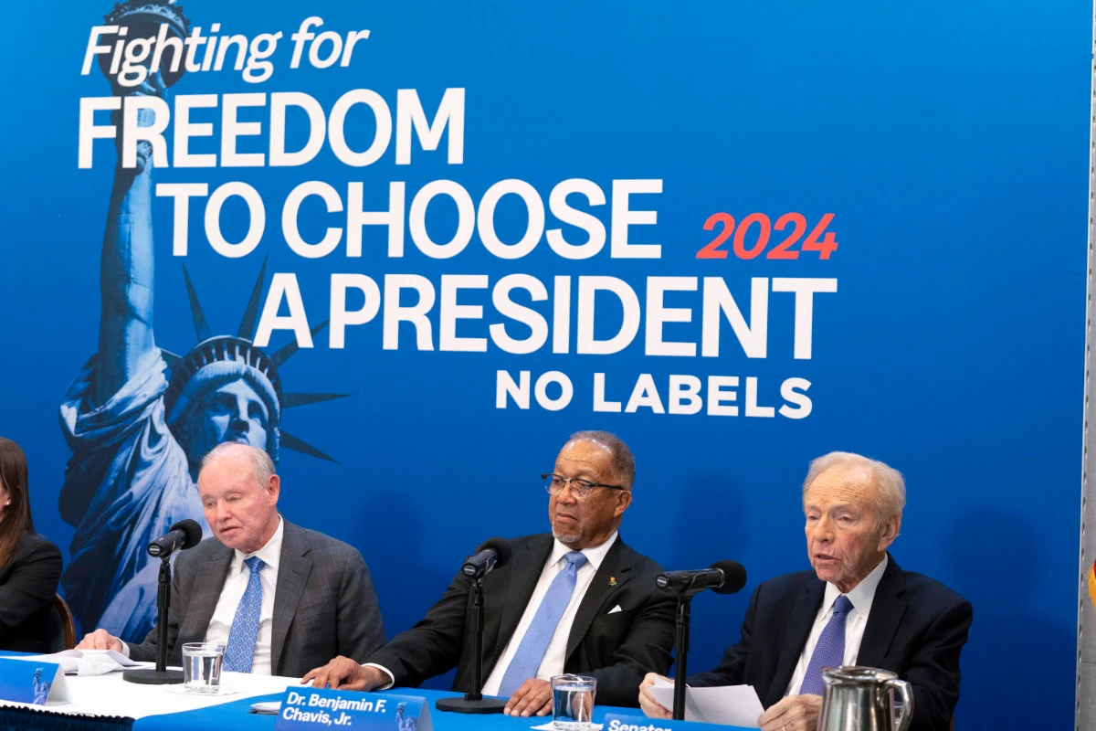 No Labels leadership and guests from left, Dan Webb, National Co-Chair Dr. Benjamin F. Chavis, and founding Chairman and former Sen. Joe Lieberman, speak about the 2024 election at National Press Club, in Washington, Jan. 18, 2024. (AP Photo/File)