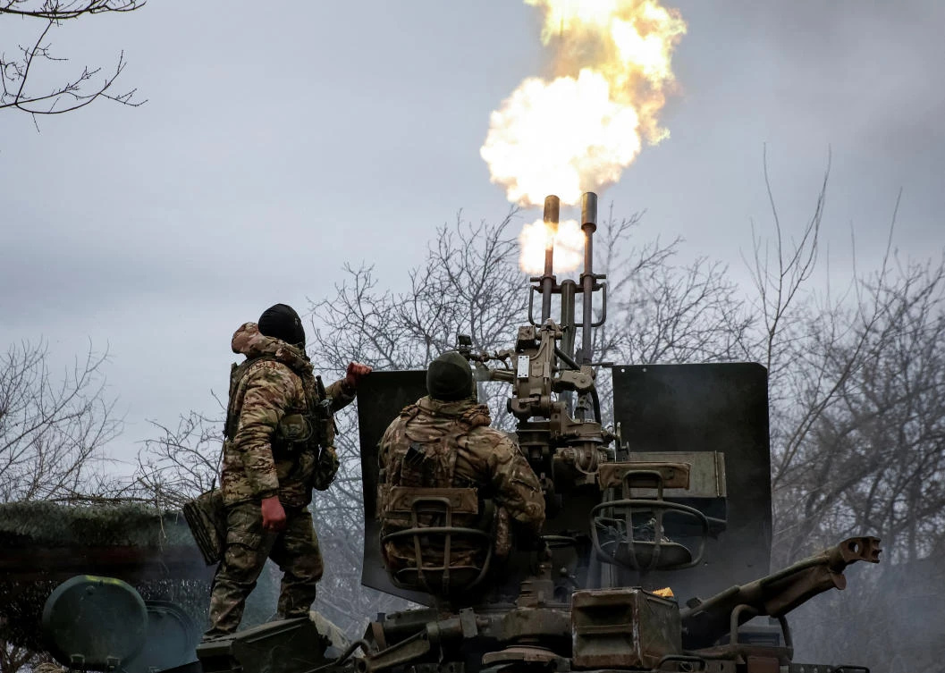 Ukrainian servicemen from air defense unit of the 93rd Mechanized Brigade fire an anti aircraft cannon at a frontline near the town of Bakhmut on Mar. 6, 2024. (Reuters)