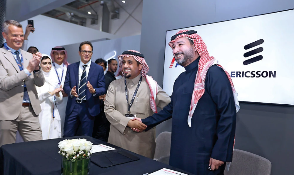 Senior officials from Ericsson and ACES at the signing ceremony.
