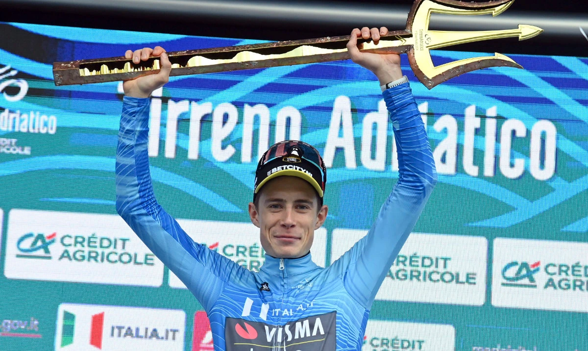 Jonas Hansen Vingegaard - Team Visma - Lease A Bike, the winner of the race, celebrates on the podium with the Trident Trophy after the 59th Tirreno - Adriatico 2024 race on Sunday in San Benedetto del Tronto, Tuscany, Italy. (AP)