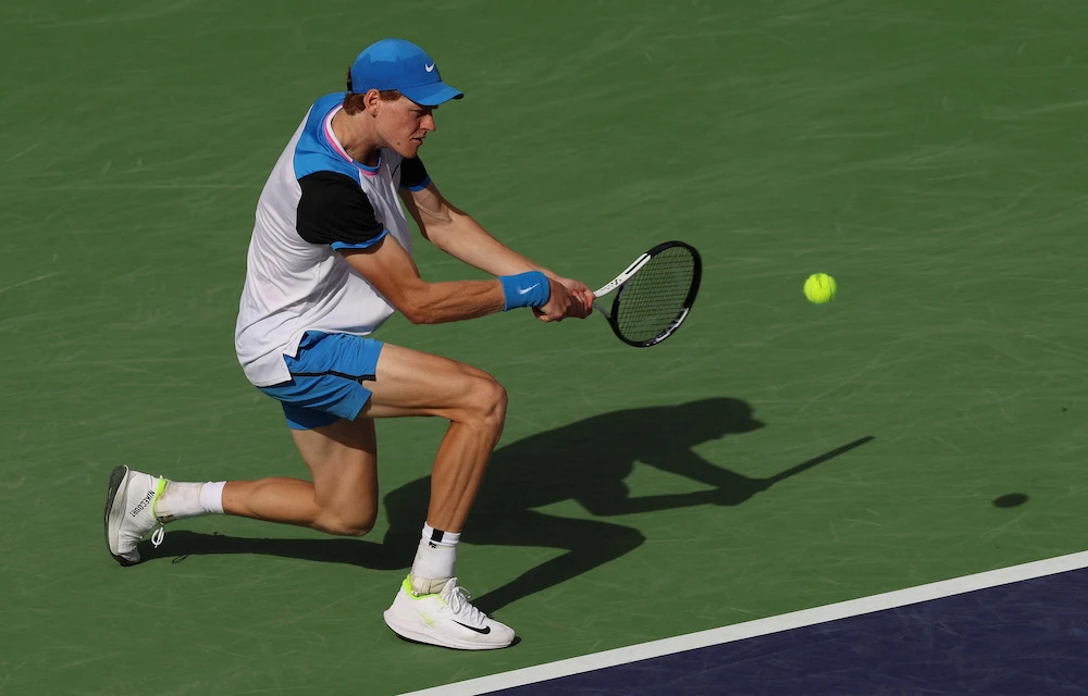 Jannik Sinner of Italy plays a backhand against Jan-Lennard Struff of Germany in their third round match during the BNP Paribas Open at Indian Wells Tennis Garden on March 10, 2024 in Indian Wells, California. (Getty Images North America/AFP)