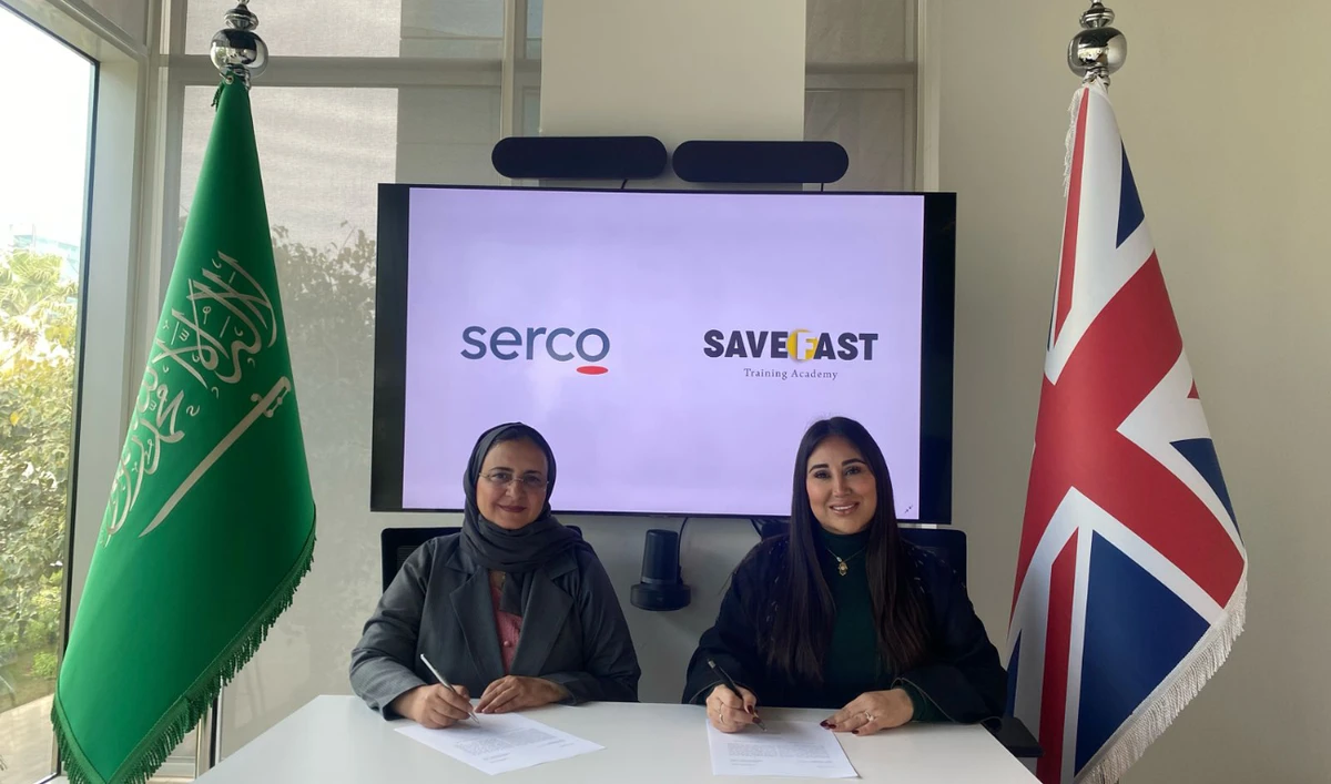 Mona Althagafi, country director, Saudi Arabia, Serco, and Mania Hossaini, CEO of SaveFast Training Academy, sign the memorandum of understanding.