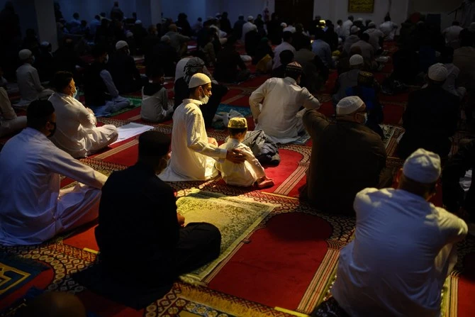 Muslim groups in the UK have warned the government that its plans to redefine extremism will stoke division and “vilify the wrong people.” (AFP/File)
