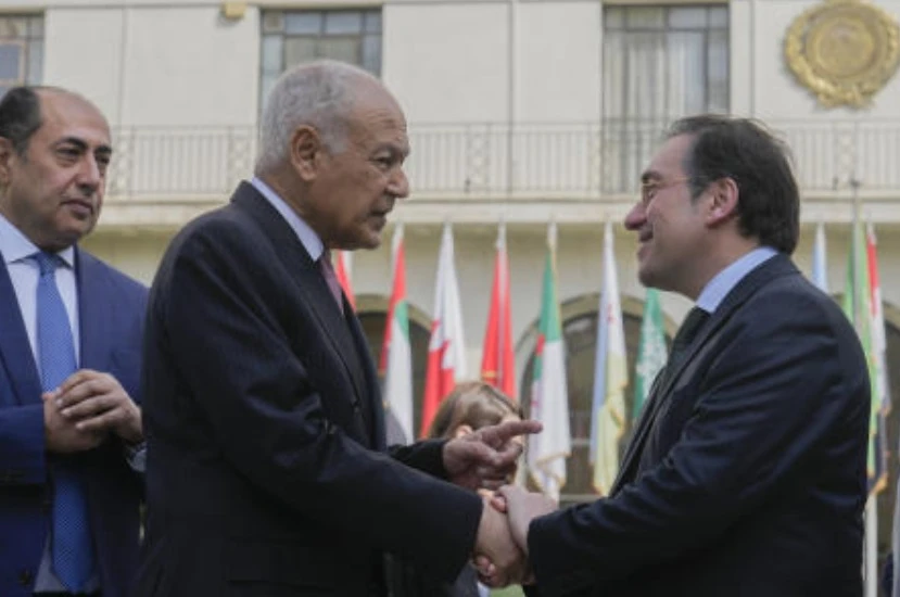 Spanish Foreign Minister Jose Manuel Albares is greeted by Arab League Secretary-General Ahmed Aboul Gheit, and his assistant Hossam Zaki during his visit at the Arab League headquarters in Cairo on Mar. 14, 2024. (AP)