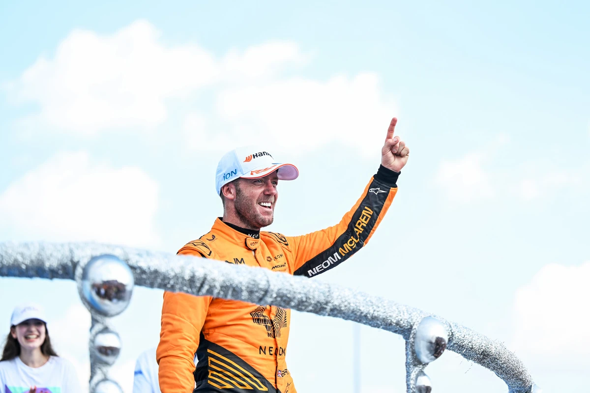 Sam Bird of NEOM McLaren Formula E Team, celebrates on the podium after winning the Sao Paulo E-Prix (Simon Galloway / LAT Images)