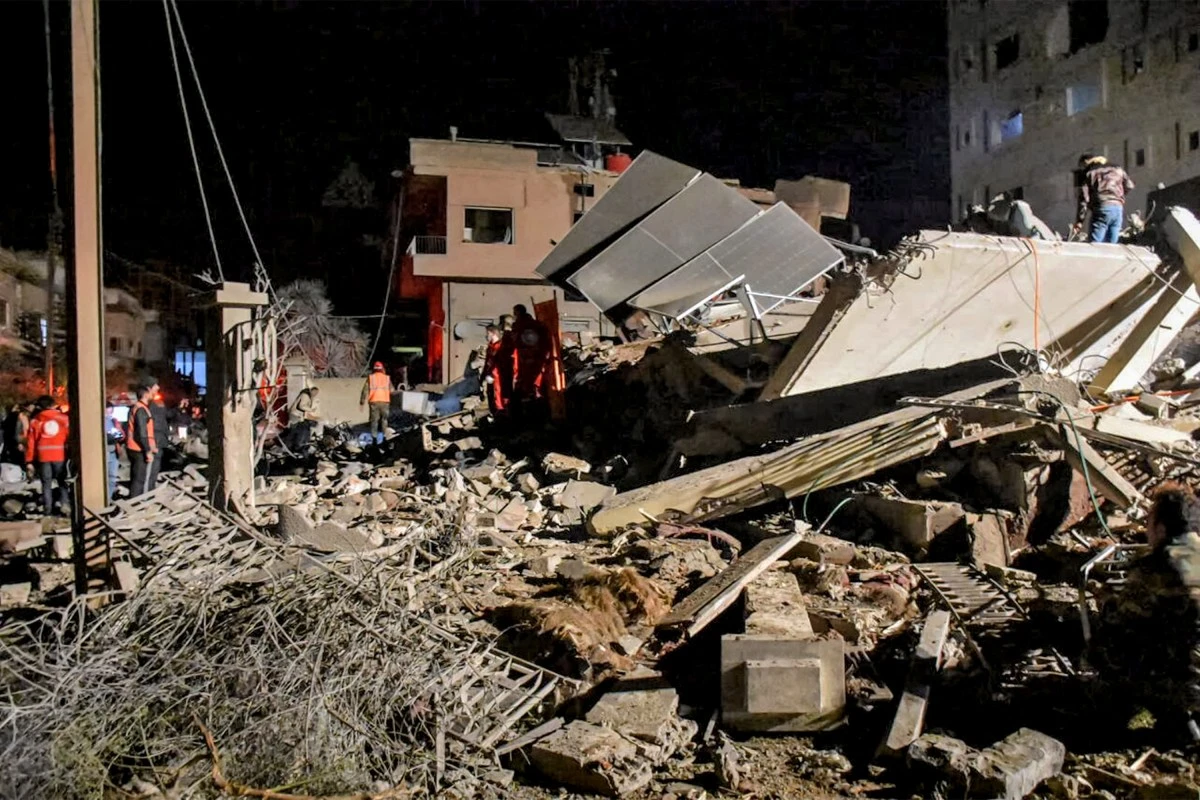 File photo of theSyria scene of an area that was hit by reported Israeli bombardment in Syria's west-central city of Homs in February. (AFP)