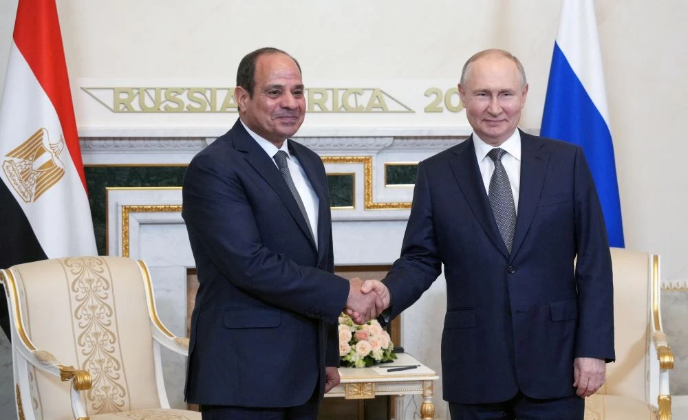 Vladimir Putin shakes hands with Abdel Fattah El-Sisi before a meeting on the sidelines of the Russia-Africa Summit, Saint Petersburg, Russia, July 26, 2023. (Reuters)