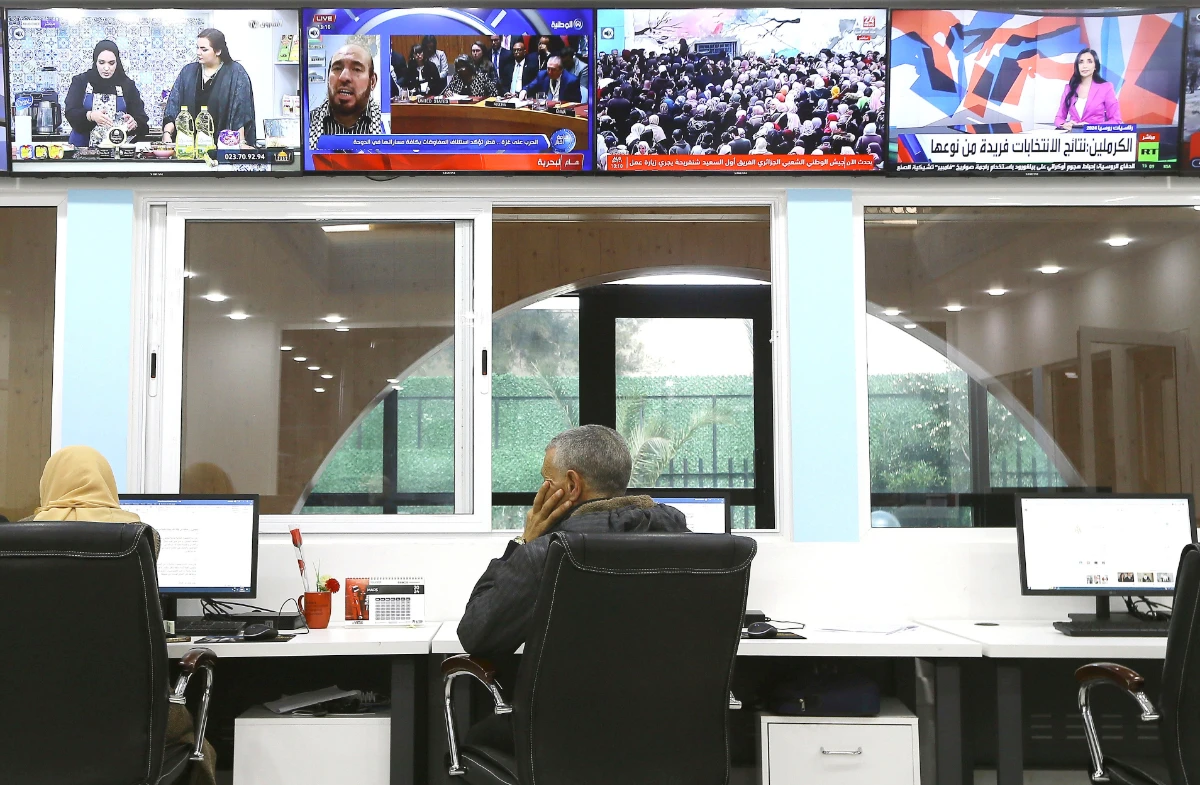 Journalists work at a private television broadcaster in Algiers, Tuesday, March 19, 2024. (AP)