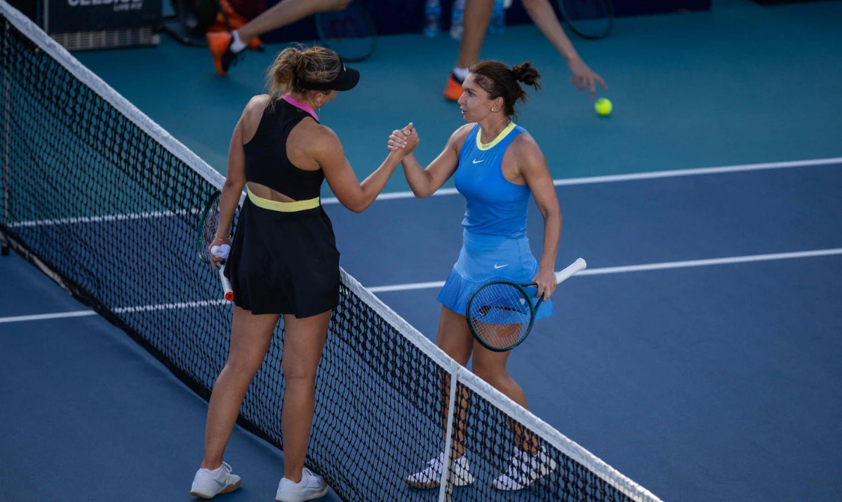 Simona Halep of Romania (R) congratulates Paula Badosa of Spain on her win during her women's singles match at the Miami Open at Hard Rock Stadium on March 19, 2024 in Miami Gardens, Florida. (AFP)