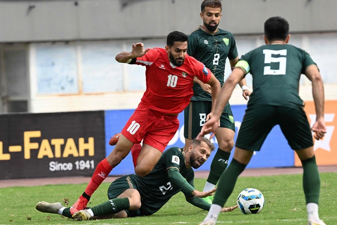 Jordan’s Mousa Al Tamari (L) and Pakistan’s Alamgir Ali Khan ((2L) fight for the ball during the 2026 FIFA World Cup qualifier football match between Pakistan and Jordan at the Jinnah Sports stadium in Islamabad on March 21, 2024. (AFP)