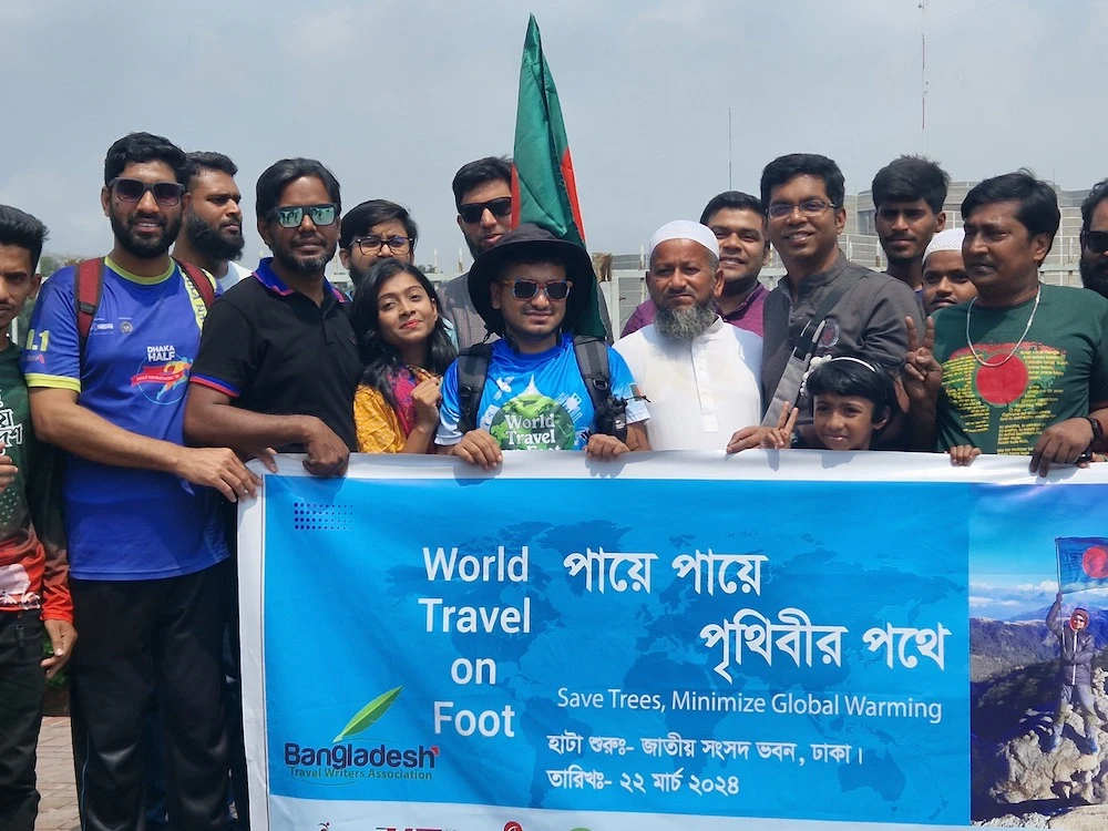 Bangladeshi hiker Saiful Islam Shanto, center, is seen off by his family members as he begins his round-the-world journey in Dhaka on March 22, 2024. (AN Photo)