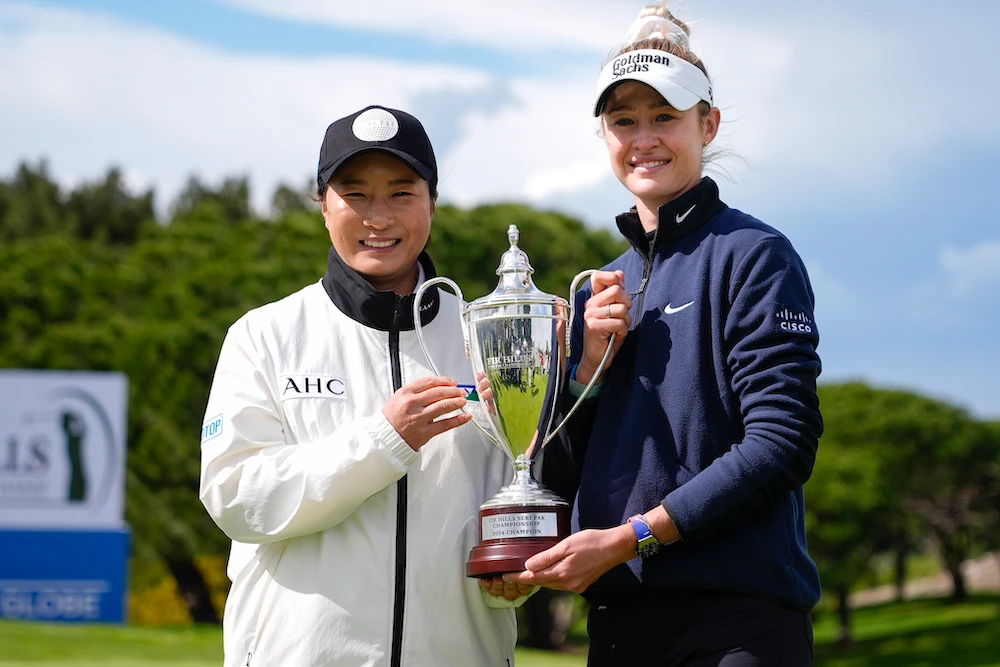 Nelly Korda, right, holds up the trophy with Seri Pak, left, of South Korea, after winning during the final round of LPGA’s Fir Hills Seri Pak Championship Sunday in Palos Verdes Estates, Calif. (AP)