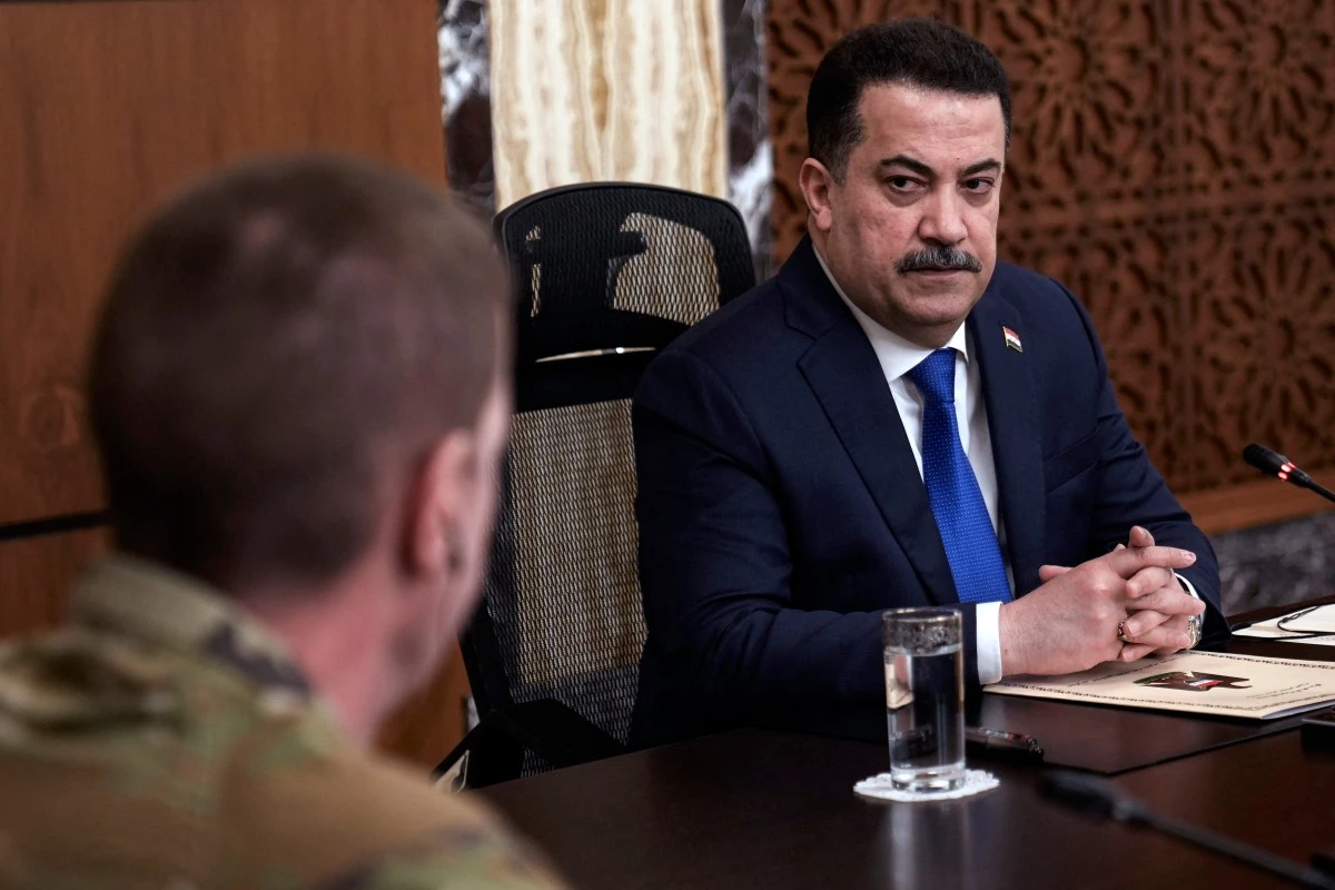 Iraqi Prime Minister Mohamed Shia al-Sudani chairs a meeting with top-ranking officials of the Iraqi armed forces and of the US-led coalition during the first round of talks on the future of American and other foreign troops in the country, in Baghdad on January 27, 2024. (File/AFP)