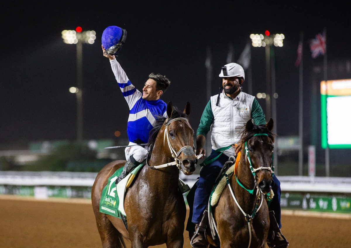 Junior Alvarado celebrates after winning the G1 Saudi Cup at King Abdulaziz Racecourse. (Erika Rasmussen/JCSA)