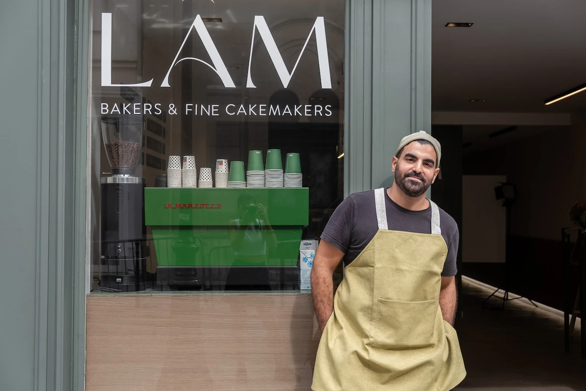 Abullatef Alrashoudi outside his Paris cafe. (Supplied)