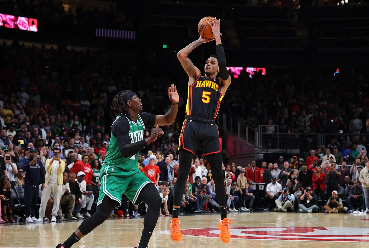 Dejounte Murray of the Atlanta Hawks hits the game-winning basket against Jrue Holiday of the Boston Celtics during overtime of an NBA game at State Farm Arena in Atlanta, Georgia. (File/AFP)