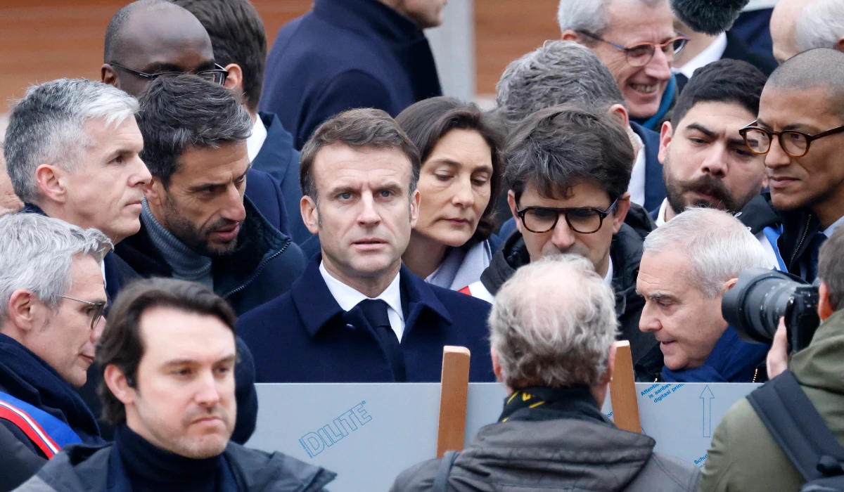 Tony Estanguet (2nd L), President Macron (3rd L) attend the inauguration ceremony of the Paris 2024 Olympic village. (AFP)