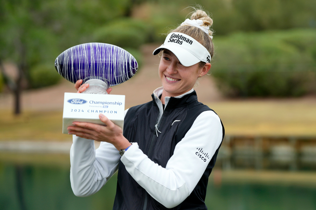Nelly Korda holds the trophy after winning the LPGA Ford Championship golf tournament in Gilbert, Ariz. (AP)