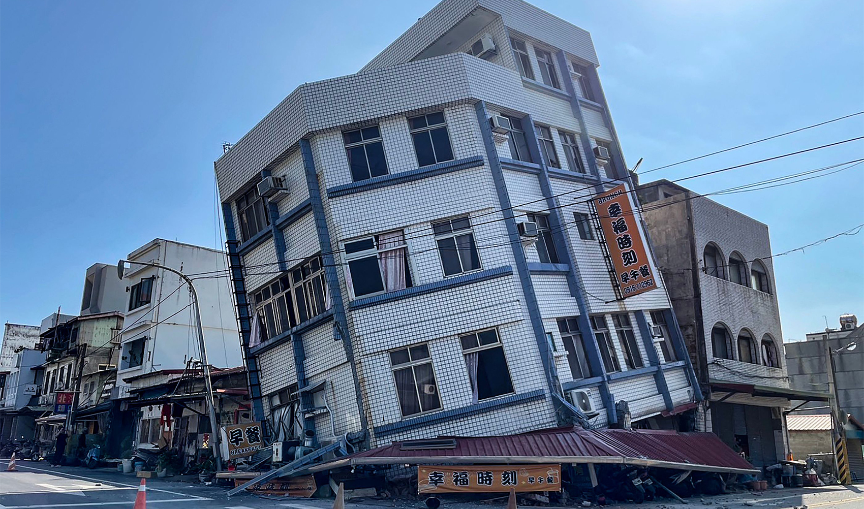 This photo taken by Taiwan's Central News Agency (CNA) on April 3, 2024 shows a damaged building in Hualien, after a major earthquake hit Taiwan's east. (CNA / AFP)