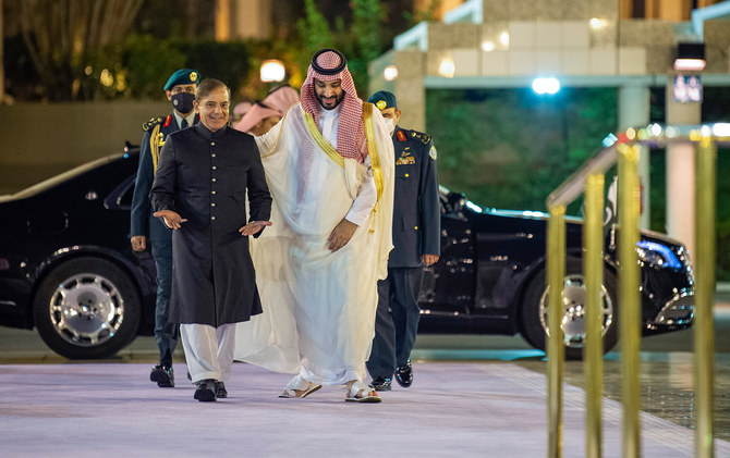 A handout picture provided by the Saudi Royal Palace shows Saudi Arabia’s Crown Prince Mohammed Bin Salman, right, welcoming Pakistani Prime Minister Shehbaz Sharif in Jeddah on April 30, 2022. (AFP file photo)