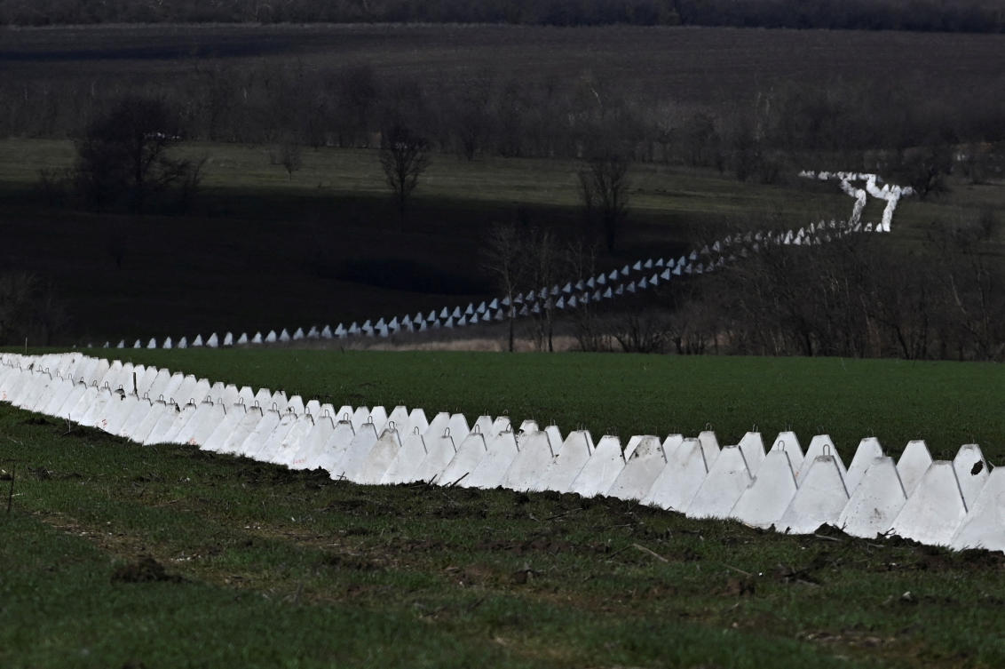 A view shows pyramidal anti-tank obstacles known as ‘dragon’s teeth’ installed across a field as a part of a new fortification line in Zaporizhzhia region on Mar. 24, 2024. (Reuters/File)