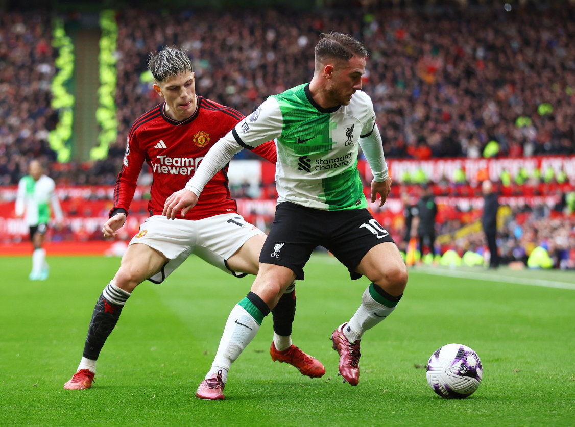 Manchester United’s Alejandro Garnacho in action with Liverpool’s Alexis Mac Allister on Sunday. (Reuters)