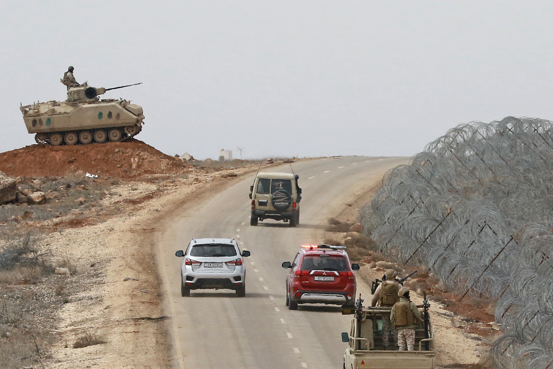 A picture taken during a tour origanized by the Jordanian Army shows soldiers patrolling along the border with Syria to prevent trafficking, on February 17, 2022. (File/AFP)