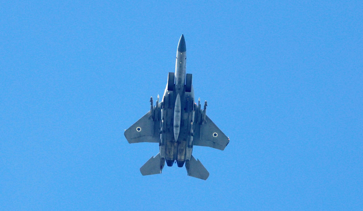A picture taken from Israel along the northern border shows an Israeli Air Force fighter jet flying over the border area with south Lebanon on April 8, 2024, amid ongoing cross-border tensions as fighting continues between Israel and Hamas militants in the Gaza Strip. (AFP)