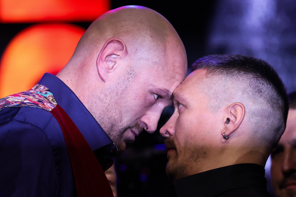 Britain's Tyson Fury (L) and Ukraine's Oleksandr Usyk during a press conference, in London, on Nov. 16, 2023, ahead of their undisputed heavyweight world championship contest set for Feb. 17, 2024 but was rescheduled for May 18, 2024 in Riyadh. (File/AFP)