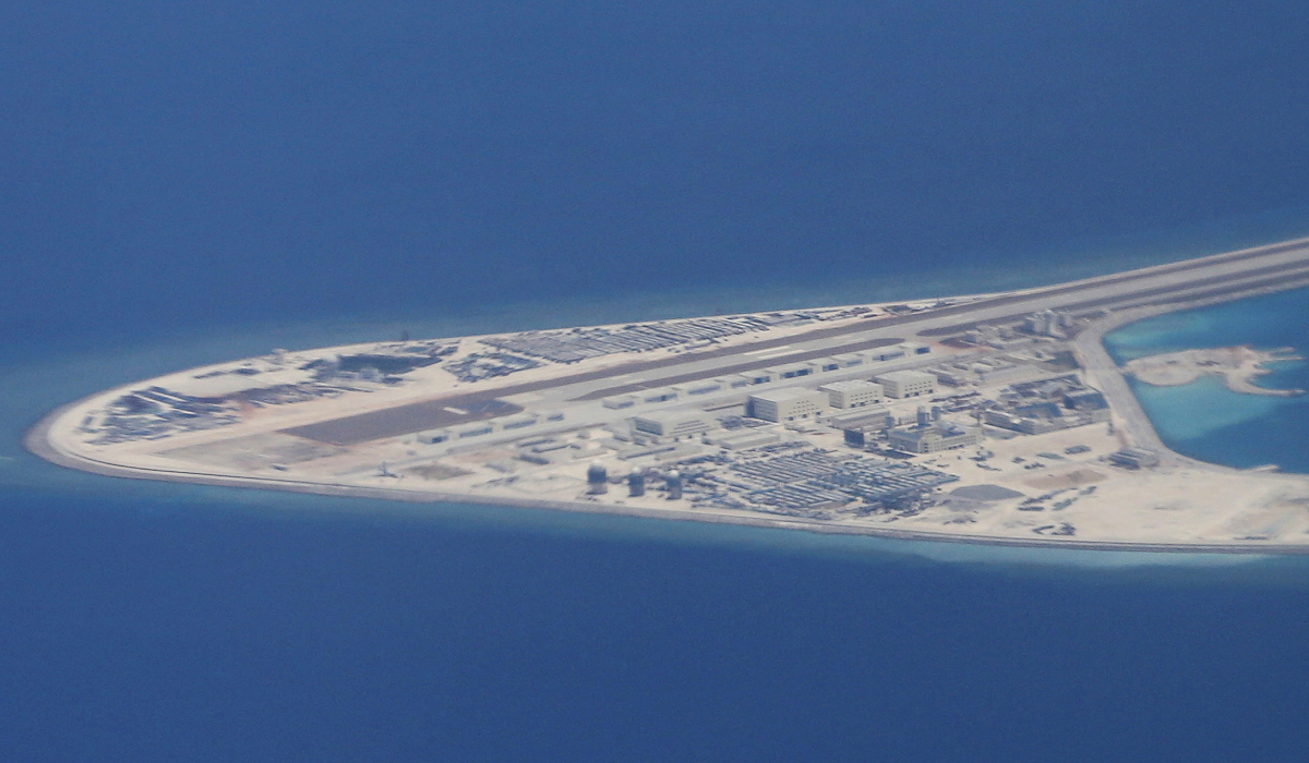 Chinese structures and an airstrip on the man-made Subi Reef at the Spratly group of islands in the South China Sea are seen from a Philippine Air Force C-130. (AP file photo)