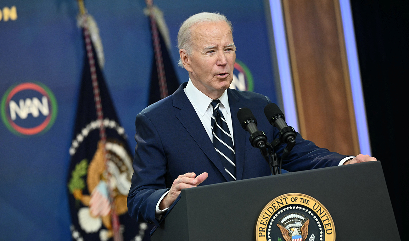 US President Joe Biden makes a virtual address to the National Action Network Convention in the South Court Auditorium of the Eisenhower Executive Office Building, next to the White House in Washington, DC on April 12, 2024. (AFP)