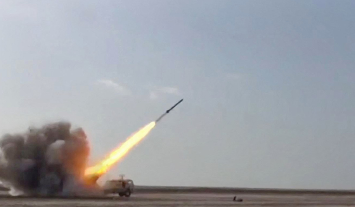 An image grab of footage obtained from Iranian State TV IRINN on December 21, 2021 shows the Islamic Revolutionary Guard Corps (IRGC) firing missiles as part of five-days military exercises in three provinces. (AFP)