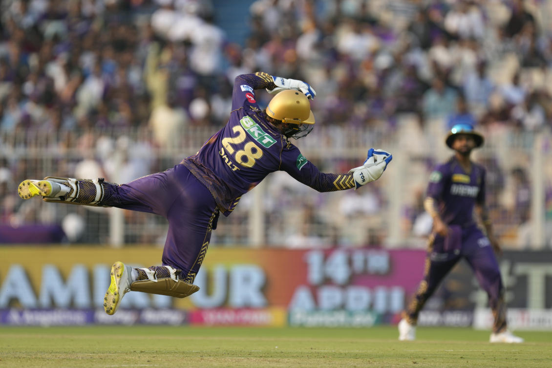 Kolkata Knight Riders’ Phil Salt dives to catch Lucknow Super Giants’ Marcus Stoinis out during the IPL matchhbetween Kolkata Knight Riders and Lucknow Super Giants in Kolkata. (AP)
