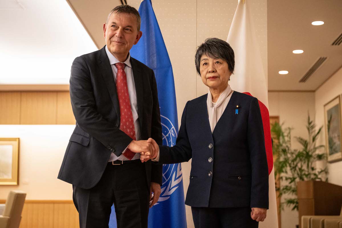 Japan's FM Yoko Kamikawa and UNRWA Commissioner General Philippe Lazzarini pose for photographs in Tokyo on March 28, 2024. (File/AFP)