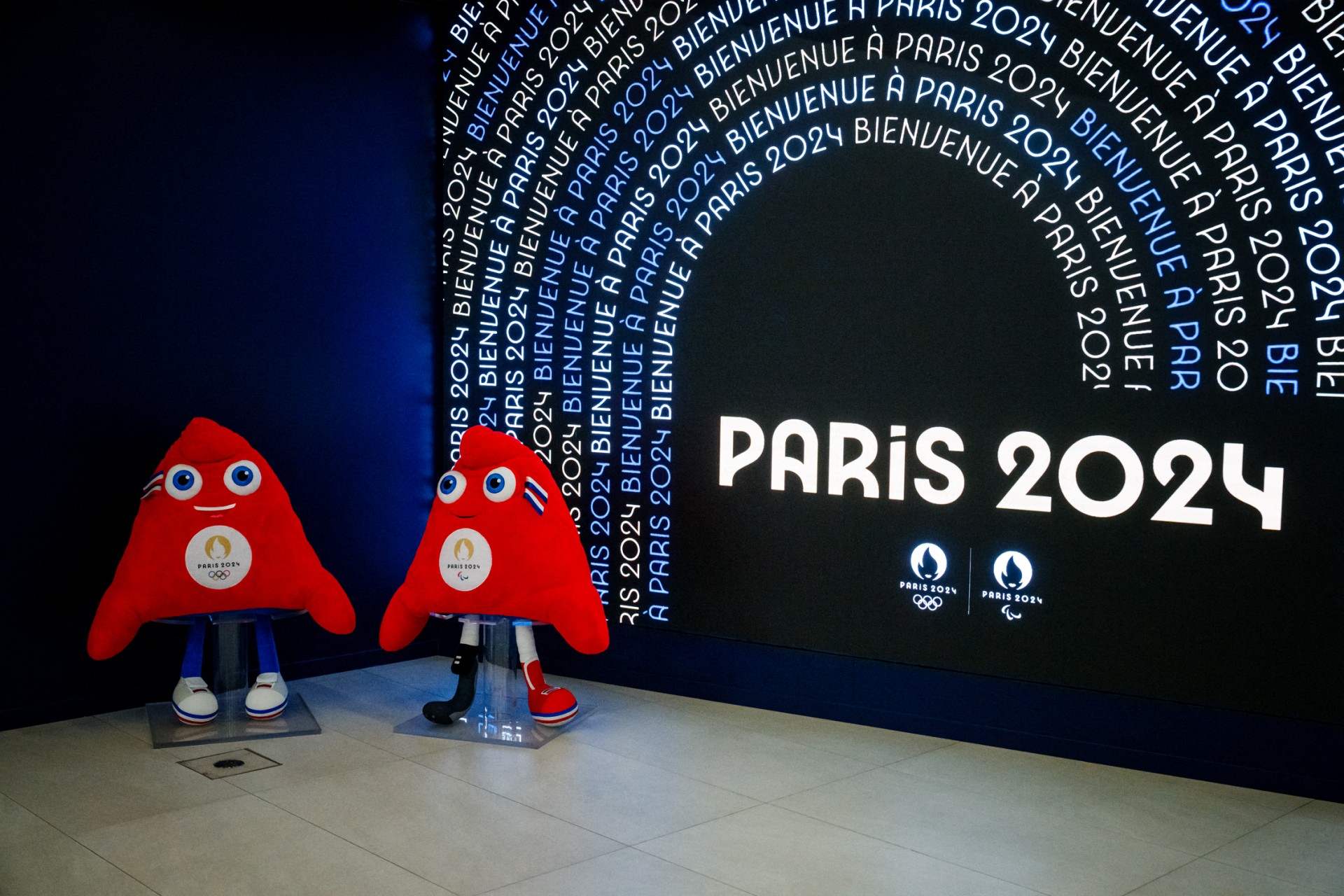 Official Olympic Phryges mascots are displayed in the headquarters of the Paris 2024 Organising Committee for the Olympic (AFP)