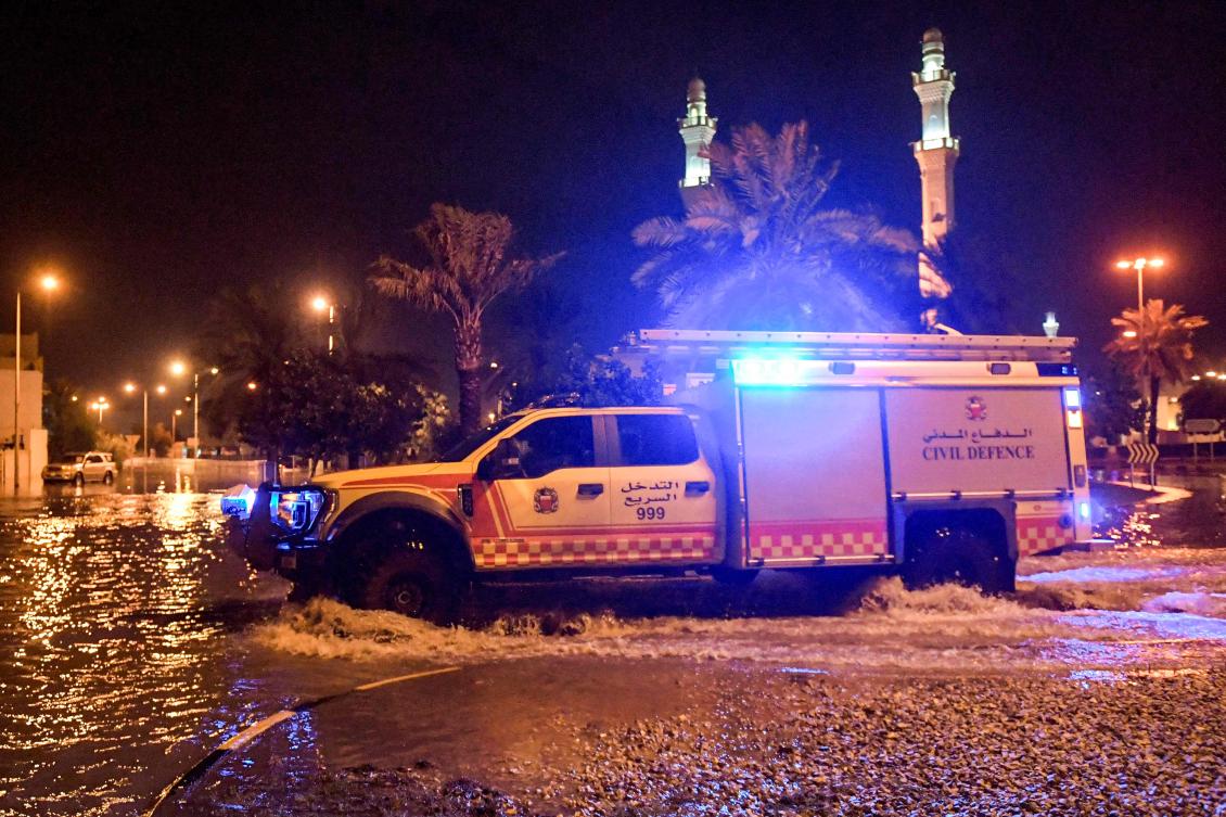 Civil defence rescue crews respond to an emergency call in Isa Town in southern Bahrain during a heavy rain storm early on April 16, 2024. (File/AFP)