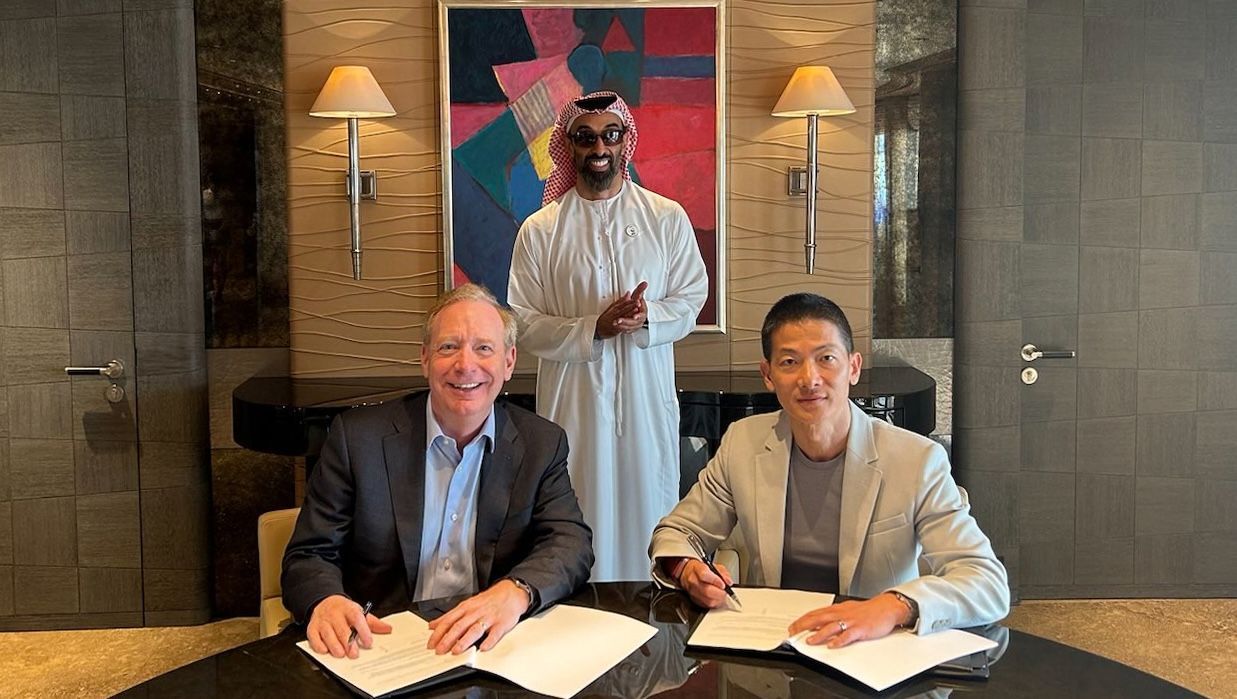 Brad Smith, vice chair and president of Microsoft; Sheikh Tahnoon bin Zayed Al-Nahyan, chairman of G42; and Peng Xiao, group CEO of G42. Supplied