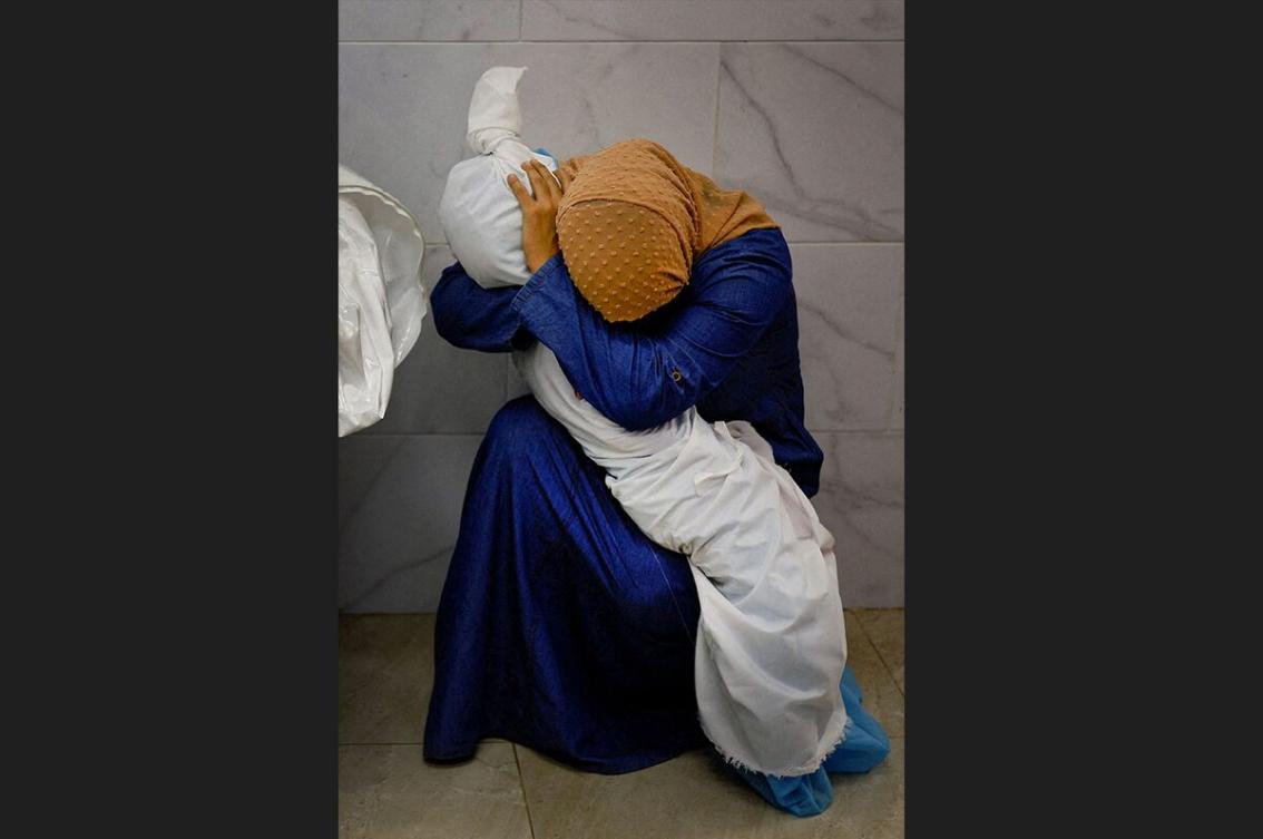 Gaza’s Mohammed Salem wins World Press Photo of the Year award with haunting image of woman cradling dead niece