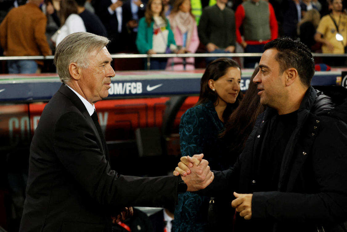 Real Madrid coach Carlo Ancelotti with FC Barcelona coach Xavi before their Copa del Rey — Semi Final — Second Leg match at Camp Nou, Barcelona, on Apr. 5, 2023. (Reuters/File)