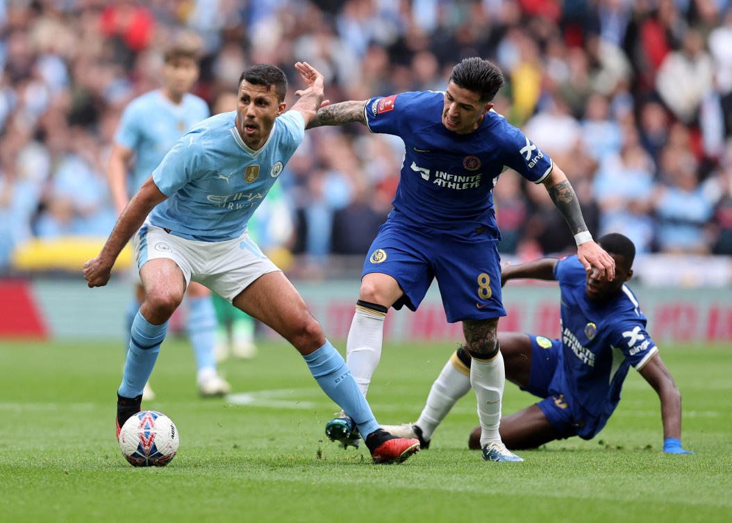 Chelsea’s Enzo Fernandez in action with Manchester City’s Rodri Soccer Football during their FA Cup — Semi Final at Wembley Stadium on Apr. 20, 2024. (Reuters)