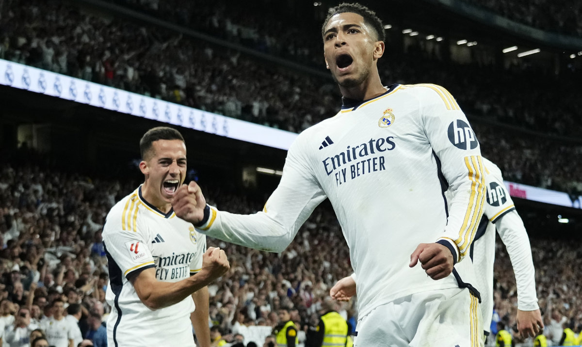 Real Madrid's Jude Bellingham, center, celebrates with teammates after scoring his side's third goal during the Spanish La Liga soccer match between Real Madrid and Barcelona at the Santiago Bernabeu stadium in Madrid Sunday. (AP)
